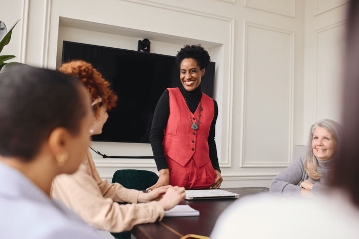 portrait-of-cheerful-mature-black-businesswoman-2024-11-27-22-41-04-utc